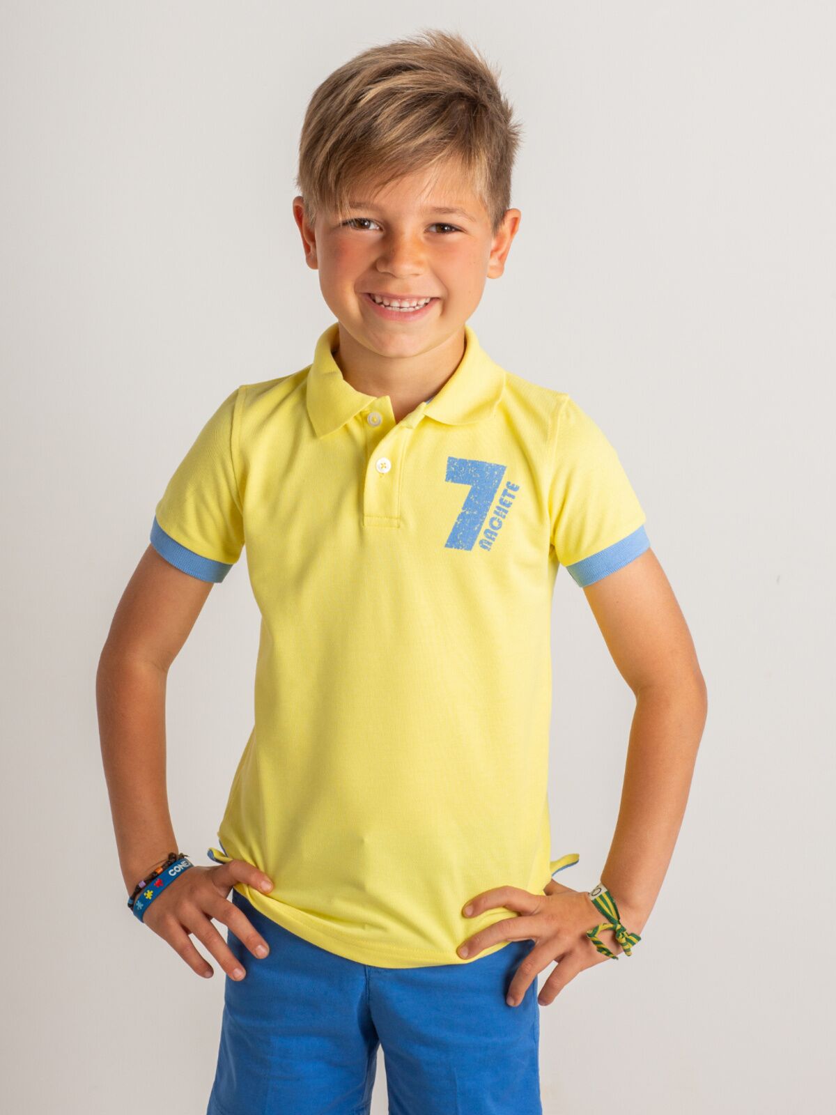 NUMBER 7 YELLOW POLO SHIRT